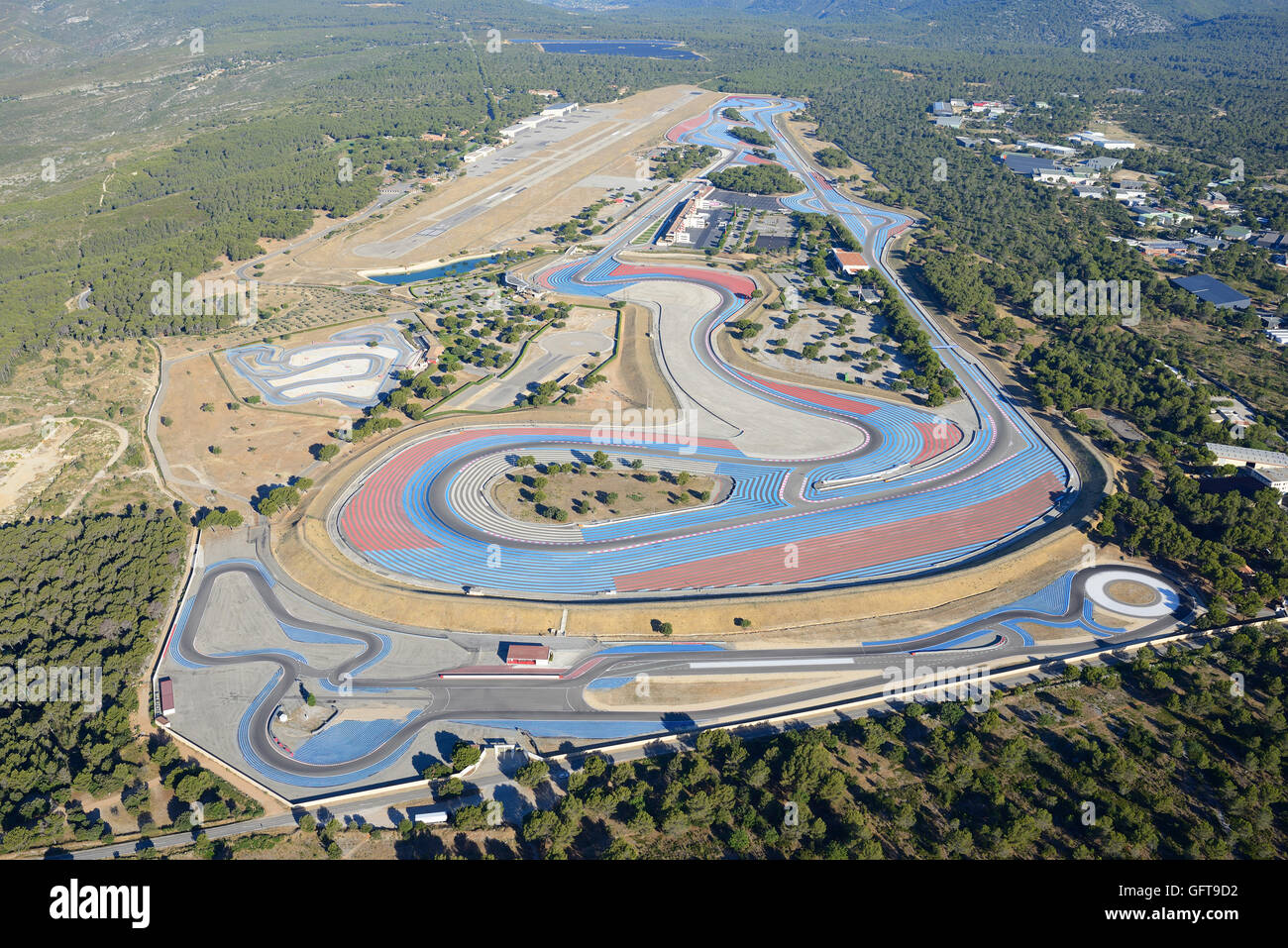 AERIAL VIEW. Le Castellet race track aka Paul Ricard race track with its blue and red run-off zones. Le Castellet, Var, Provence, France. Stock Photo