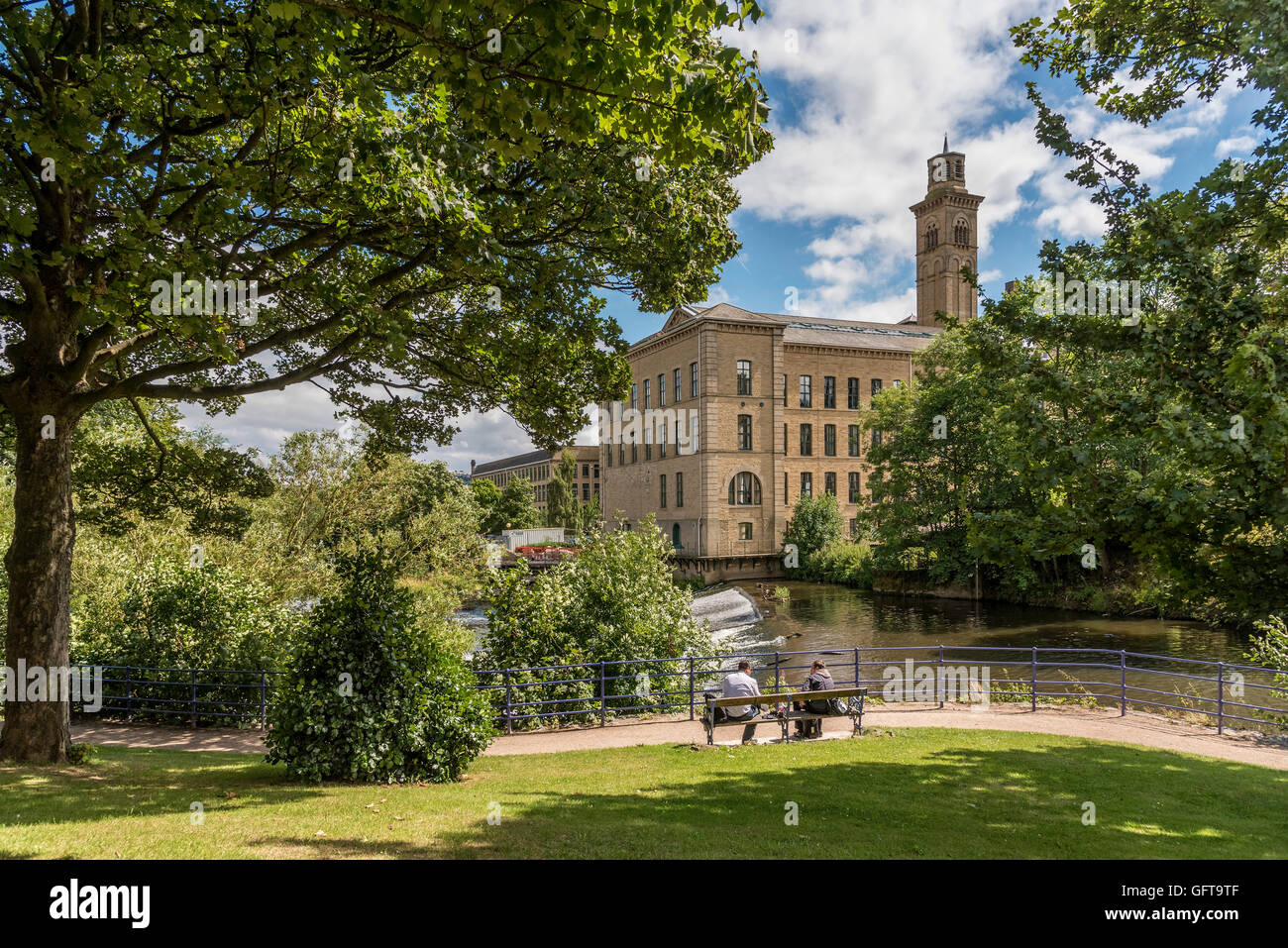 New Mill at Saltaire in West Yorkshire. An NHS establishment beside the river Aire. Stock Photo