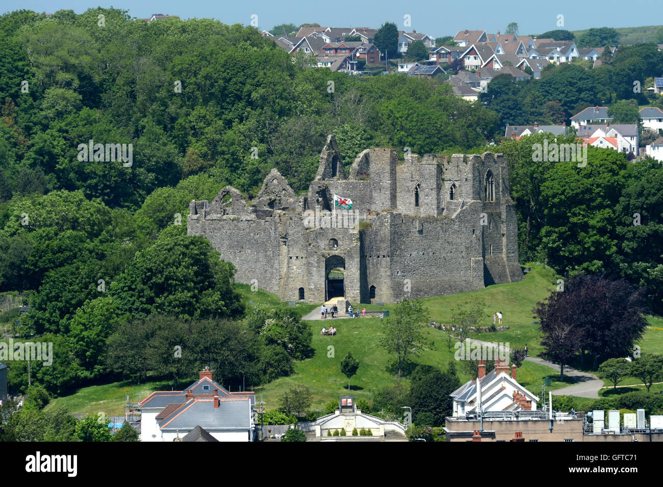 Oystermouth castle overlooking Mumbles village, Swansea, Wales - historic ruins of castle with ramparts,  towers and ancient walls remaining. Stock Photo