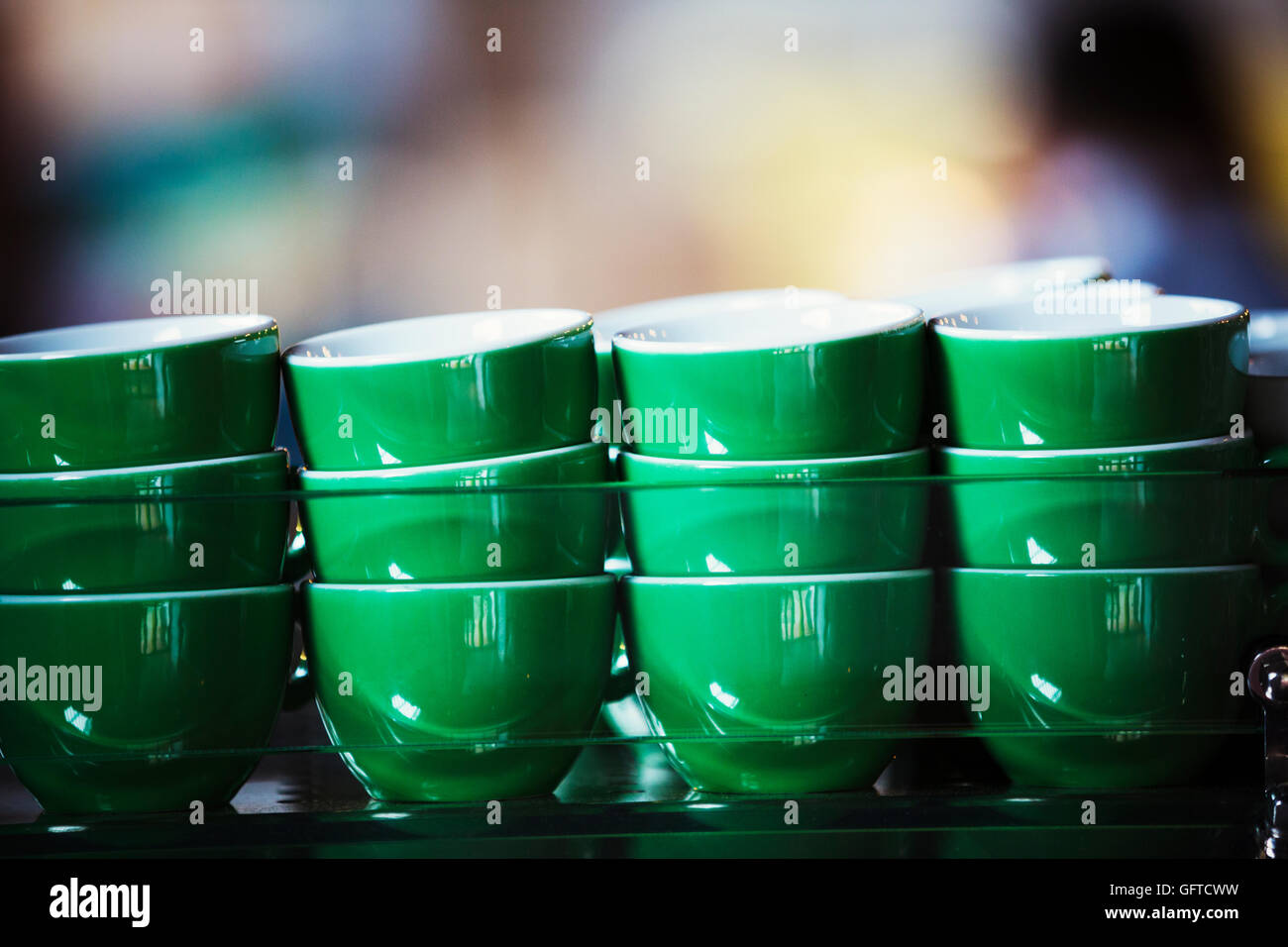 Green coffee cups stacked up Stock Photo Alamy