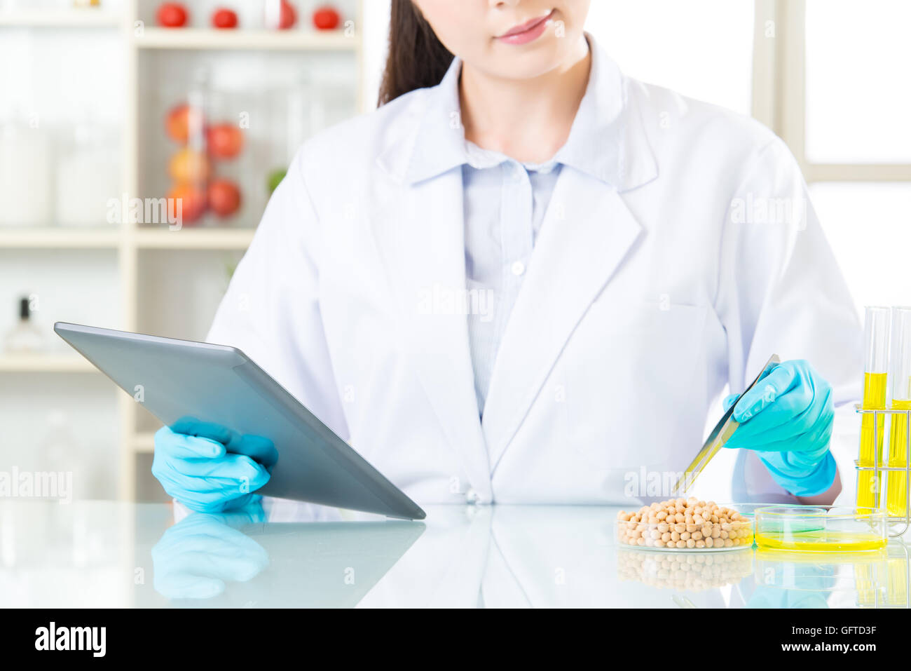 looking at lab tube and find the answer for genetic modification food ...