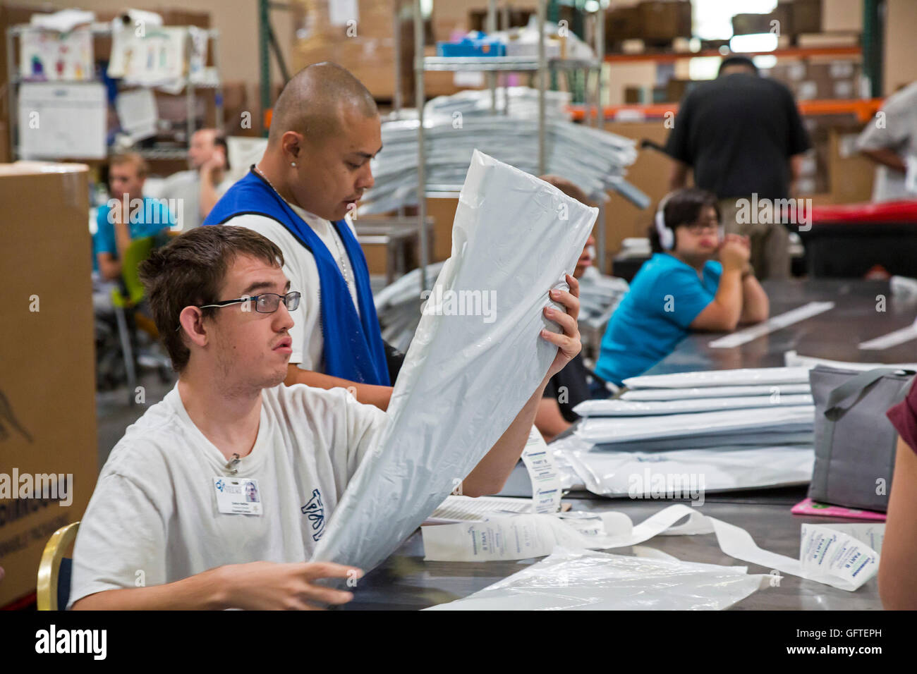 Las Vegas, Nevada - People with intellectual disabilities work at the nonprofit Opportunity Village. Stock Photo