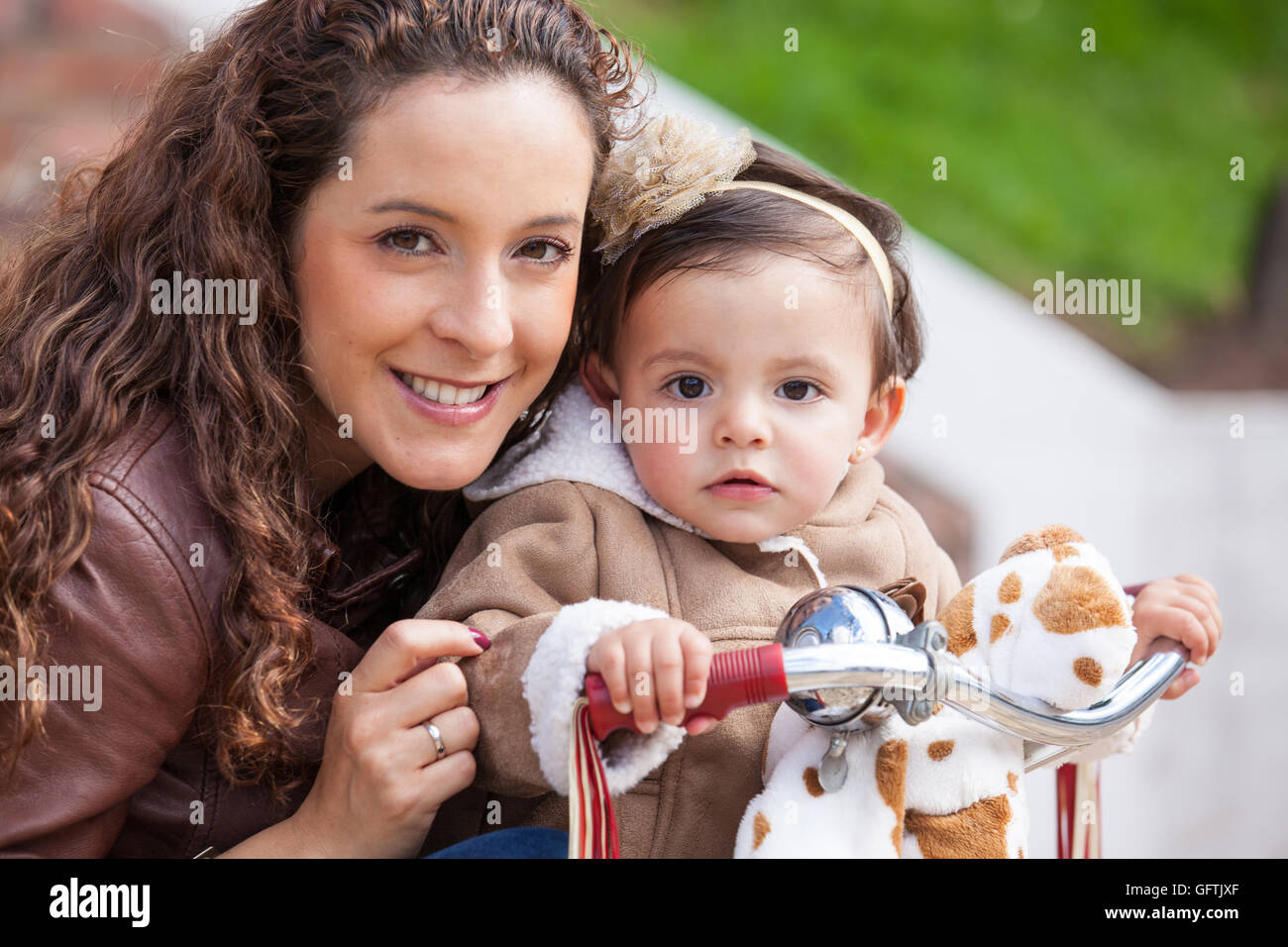 With mom riding my tricycle Stock Photo Alamy