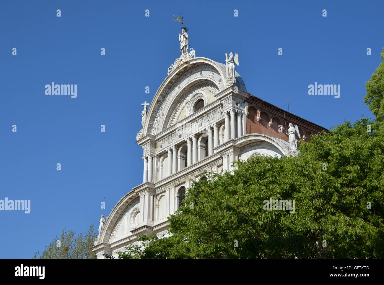 Church rises above trees hi-res stock photography and images - Alamy