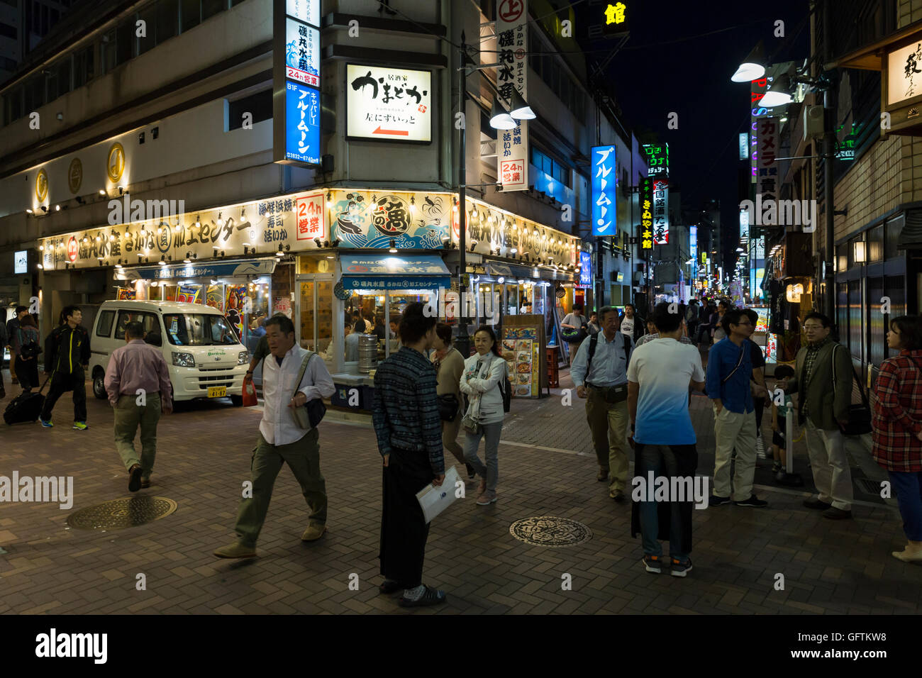 Nightlife with illuminated advertising in the side streets around the Ueno train station in Tokyo, Japan Stock Photo