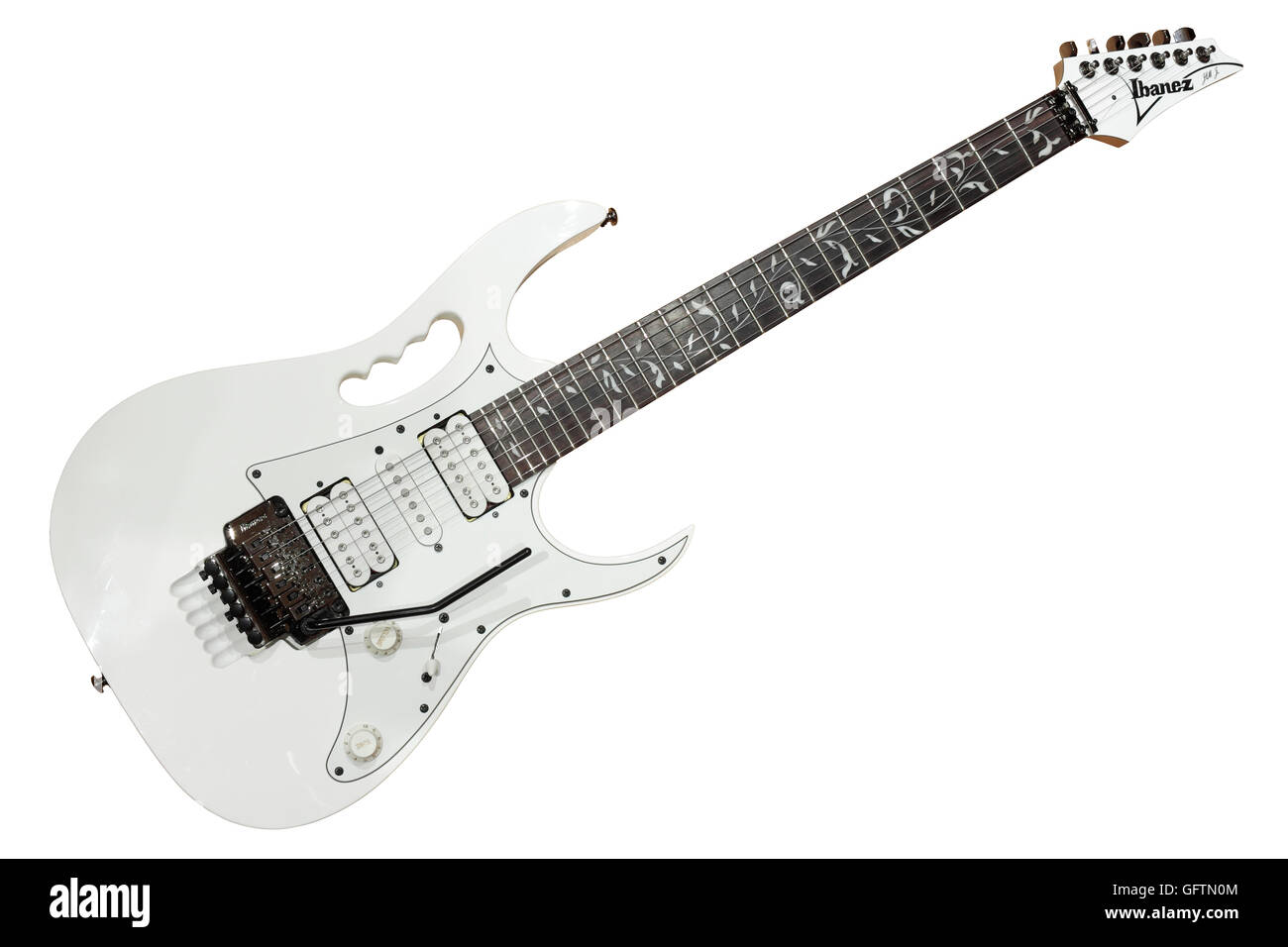 A White Ibanez Jem Jnr electric superstrat style guitar isolated on a white background Stock Photo