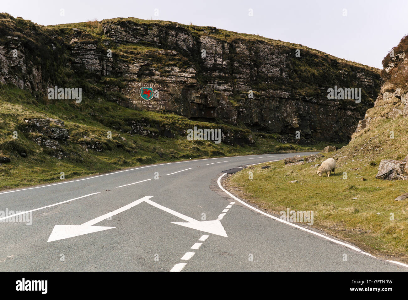 Welcome to the Valleys on the A4107 junction with the A4061, Rhondda Valley, Wales. Stock Photo