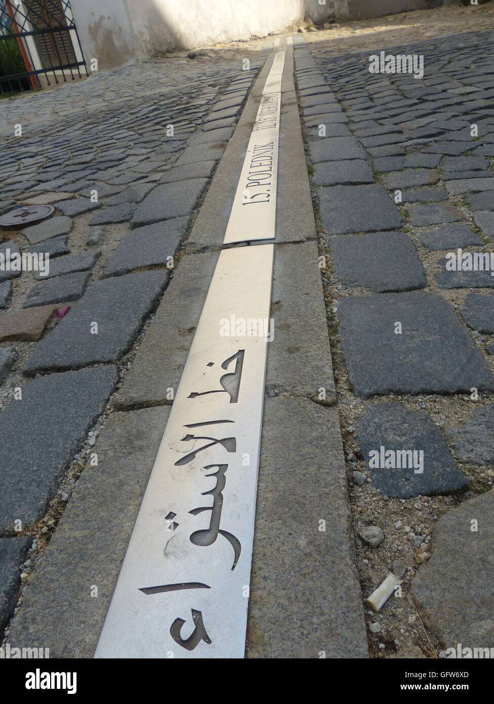 15th Longitude, Arabic language, geography, marked on road, running through, East 15 Longitude, east of Greenwhich, geographic Stock Photo