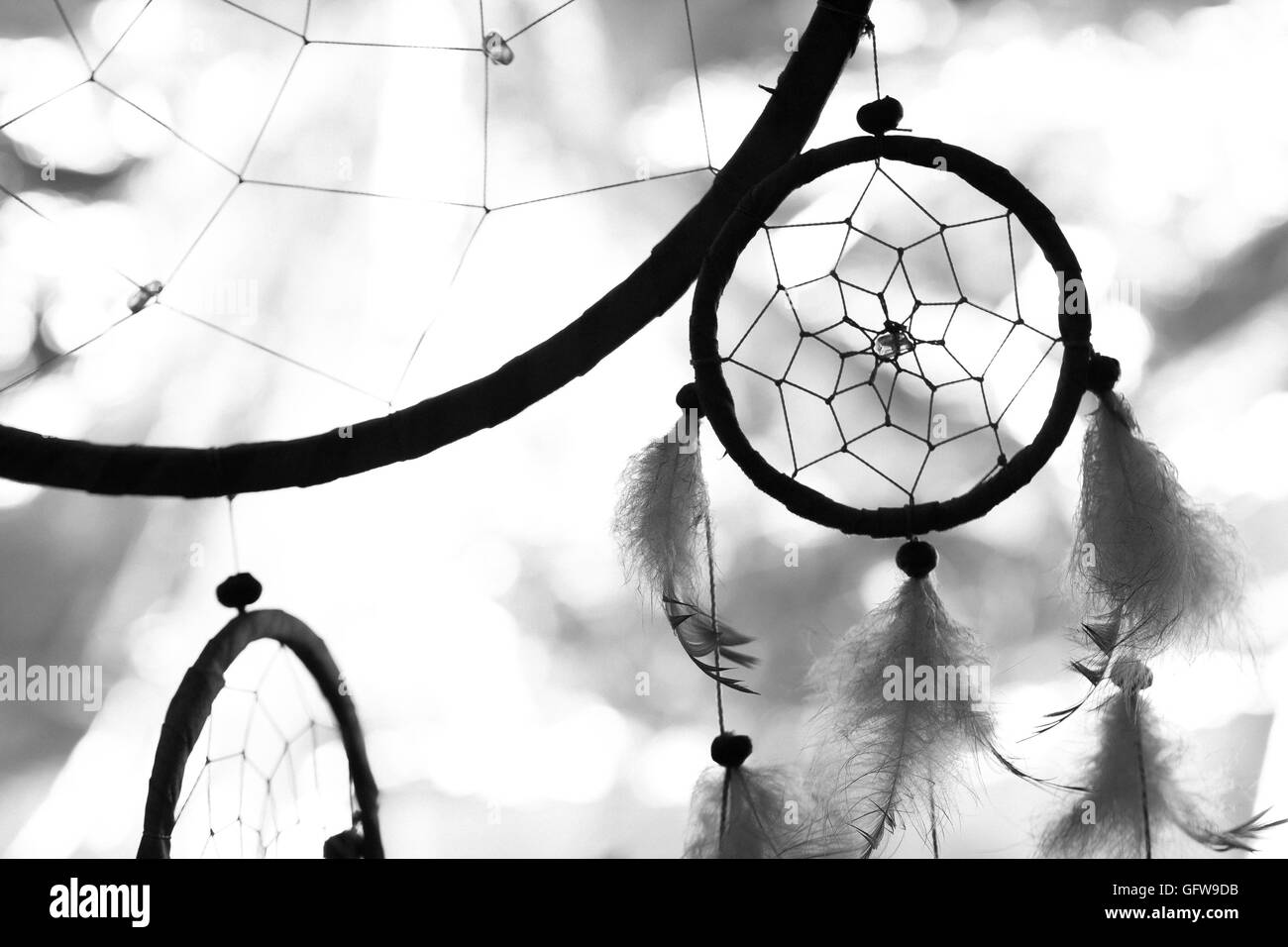black and white photo of a dream catcher at sunset purple dark background  Stock Photo - Alamy