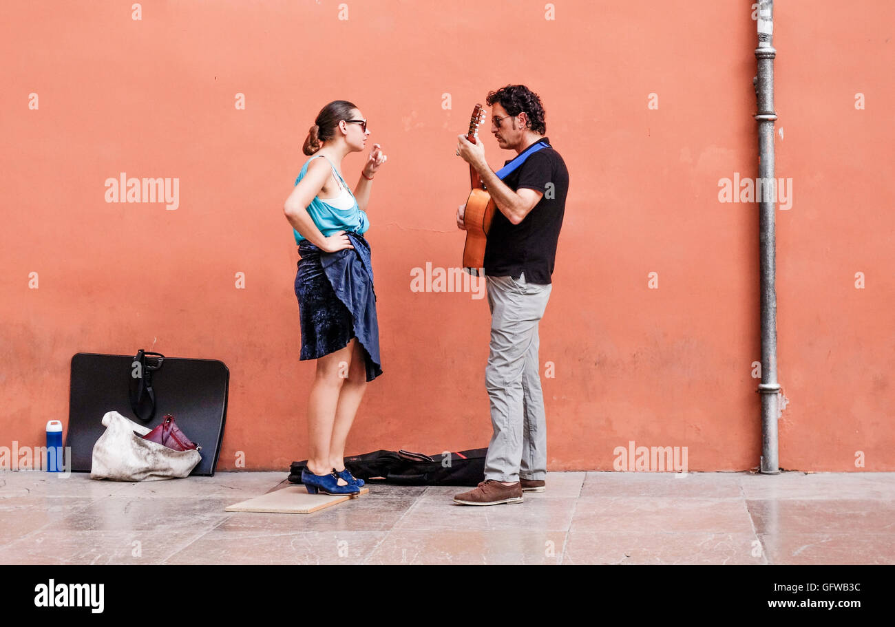 Couple, street musicians, flamenco, dancing, preparing a show, Granada, Spain. Stock Photo