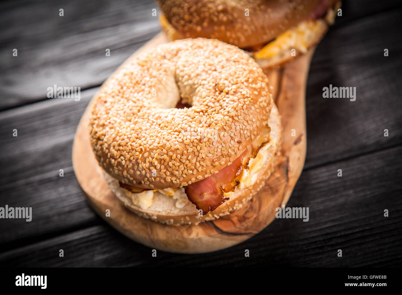 Bagel with bacon and egg Stock Photo