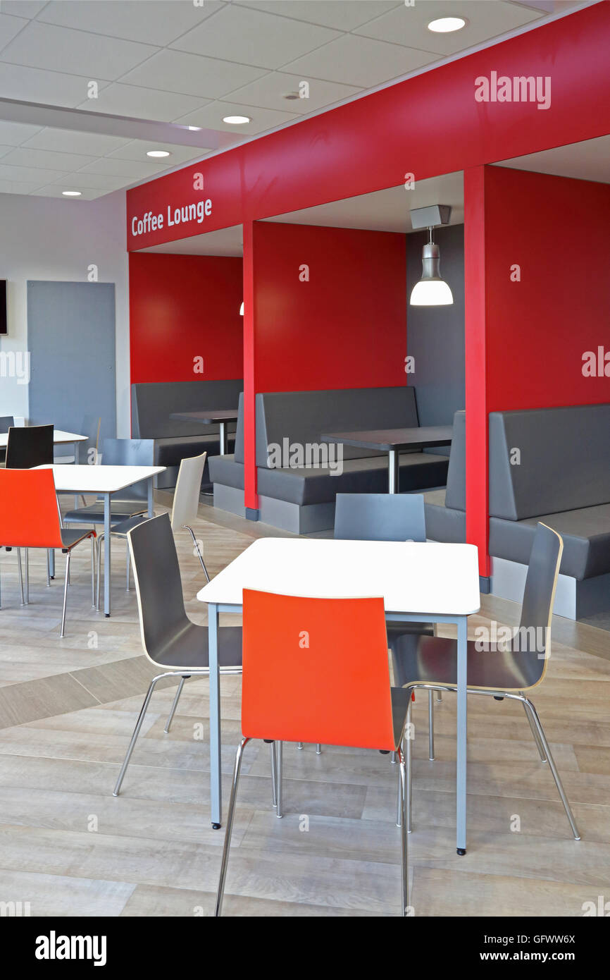 smart staff welfare area in a new factory showing seating for eating and socialising during work breaks Stock Photo
