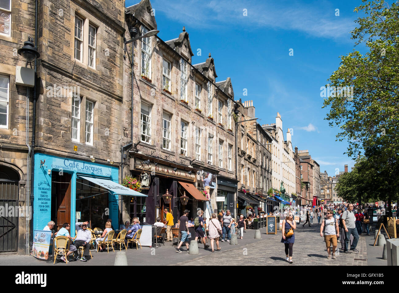 View along busy historic street in Grassmarket district of Edinburgh , Scotland, United Kingdom Stock Photo