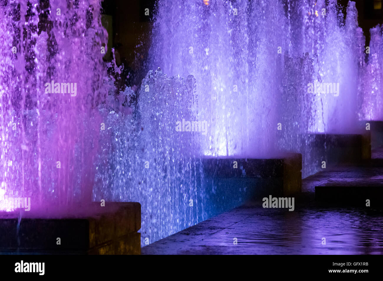 Color water fountain at night Stock Photo Alamy