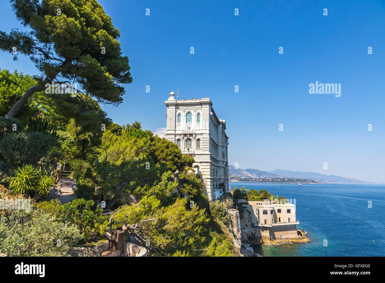 Building of Oceanographic Museum (French: Musee oceanographique) in Monaco-Ville, Monaco. Side view with Mediterranean sea Stock Photo