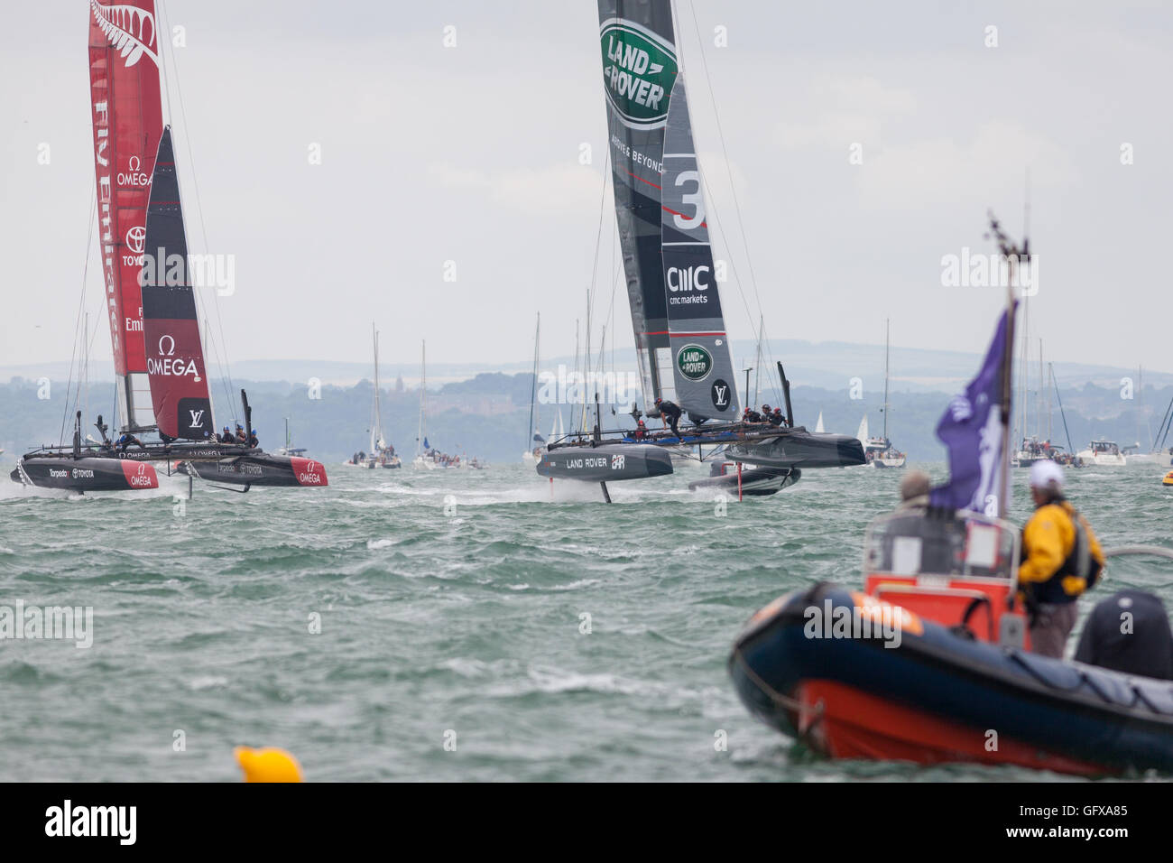 Oracle Team USA (left) Land Rover BAR (right) sailing teams in action