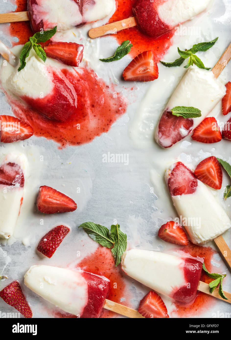 Strawberry yogurt ice cream popsicles with mint Stock Photo Alamy