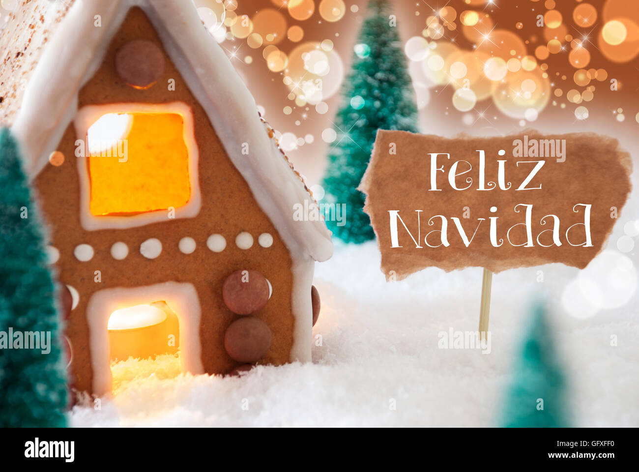 Gingerbread House, Bronze Background, Feliz Navidad Means Merry Christmas Stock Photo