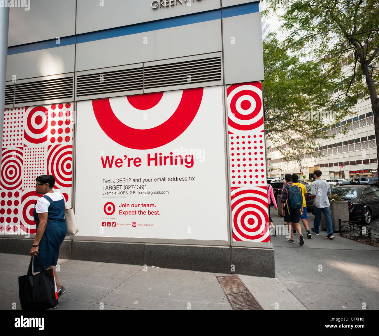 A sign on the exterior of an under construction Target store in the Tribeca neighborhood of New York on Friday, July 29, 2016 encourages prospective employees to apply for jobs in the retail industry at Target. In order to boost stagnant sales growth Target is opening smaller urban stores with 20 open already and 14 more expected to open in 2016. (© Richard B. Levine) Stock Photo