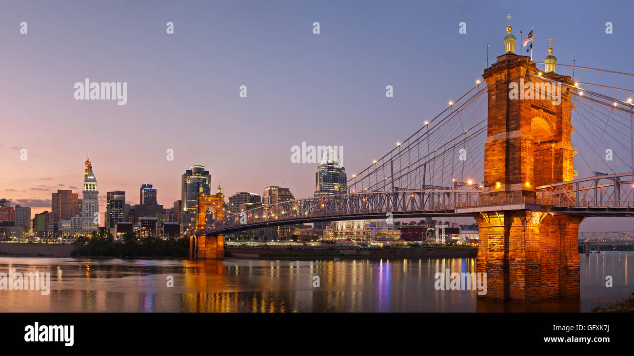 Image of Cincinnati and John A. Roebling suspension bridge at twilight. Stock Photo