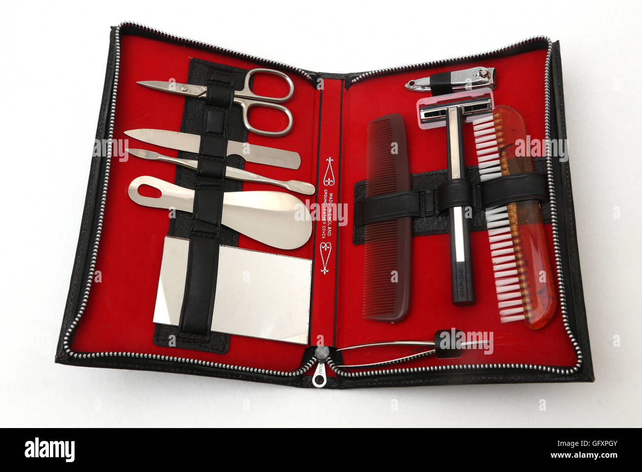 Man's Grooming Kit - Scissors, Comb, Brush, Manicure Set, Mirror, Razor, Shoe Horn And Tweezers Stock Photo