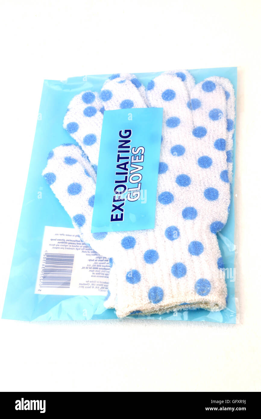 White With Blue Polka Dots  Exfoliating Gloves Stock Photo