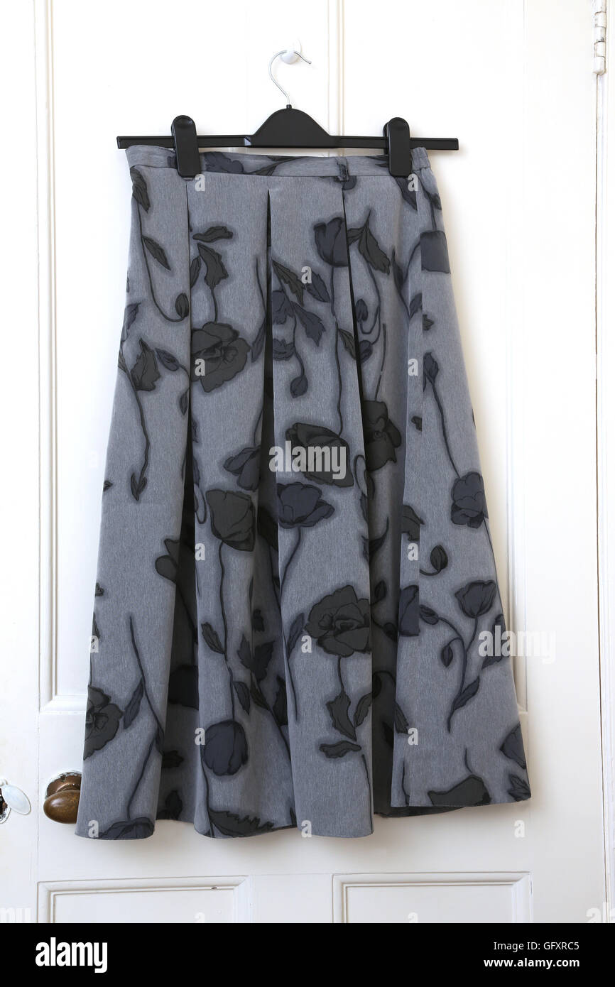 Grey Pleated Skirt With Floral Pattern Stock Photo Alamy