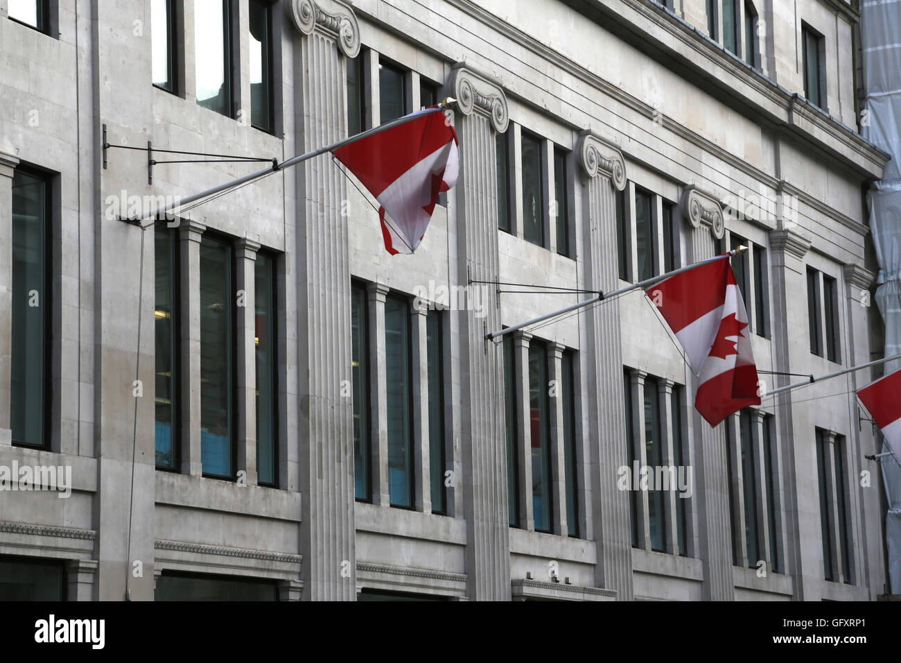 London England Trafalgar Square Canada House With Canadian Flags Stock Photo