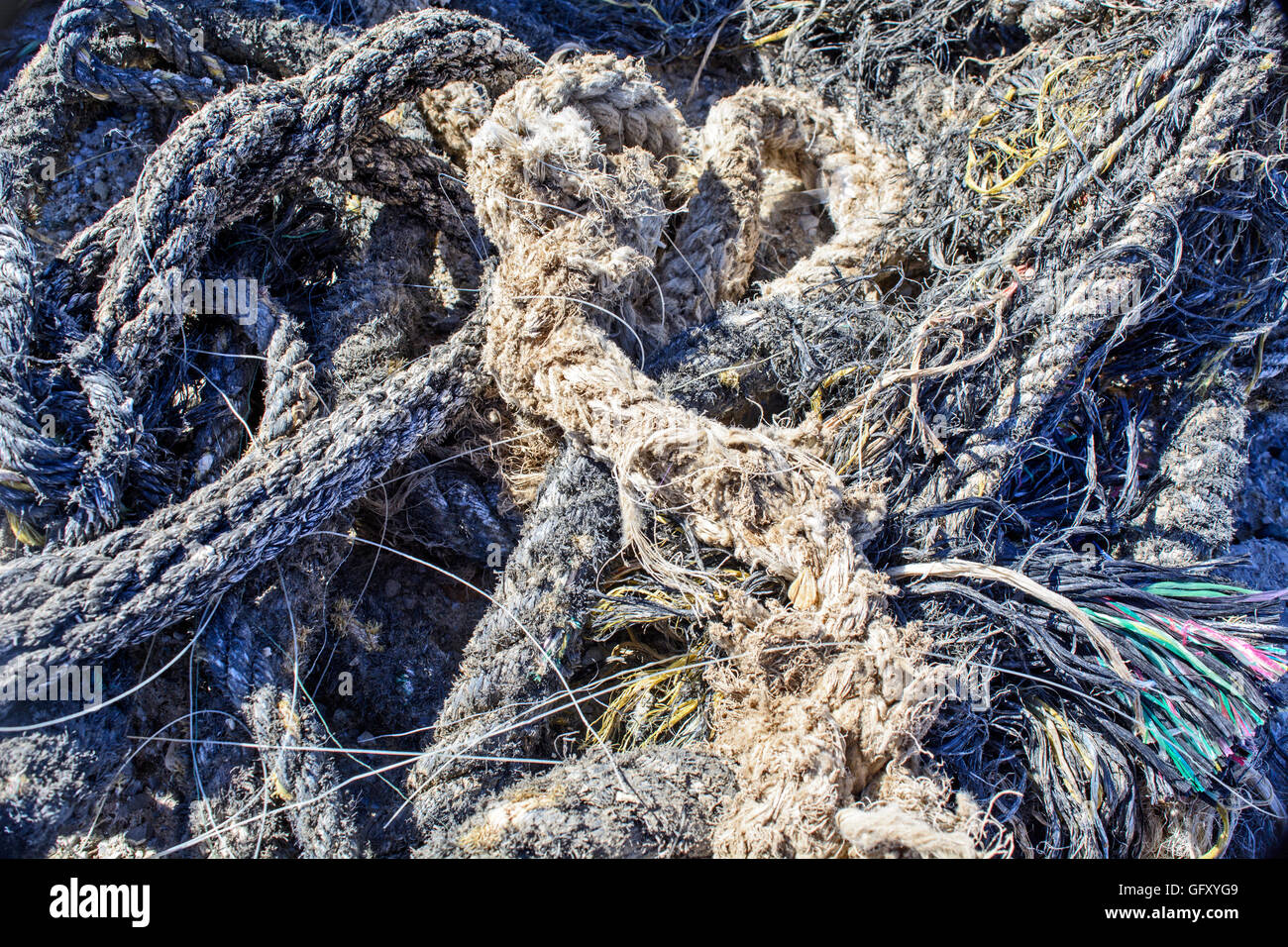 The ball of the old marine rope in the harbor Stock Photo - Alamy