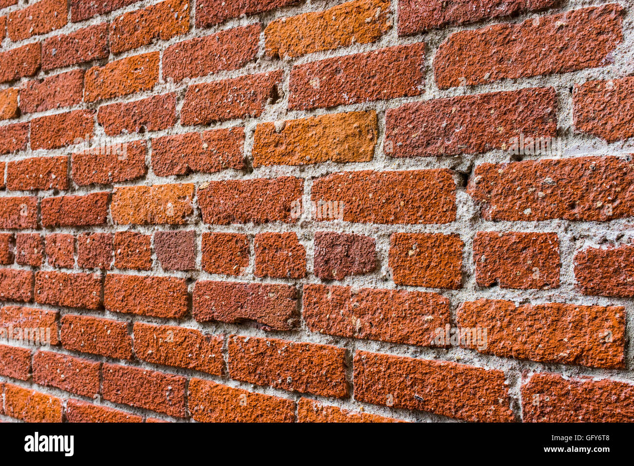 Line Of Red Brick And Mortar Form Wall Structure In City Alley Stock Photo Alamy