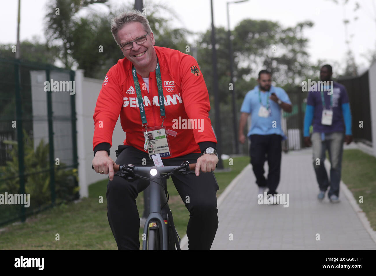 Rio de Janeiro, Brazil. 2nd Aug, 2016. Dirk Schimmelpfenning, head of competitive sports at the German Olympic Sports Association (DOSB), pedals a bicycle during the media day prior to the Rio 2016 Olympic Games in Rio de Janeiro, Brazil, 2 August 2016. The Rio 2016 Olympic Games take place from 05 to 21 August. Photo: Michael Kappeler/dpa/Alamy Live News Stock Photo