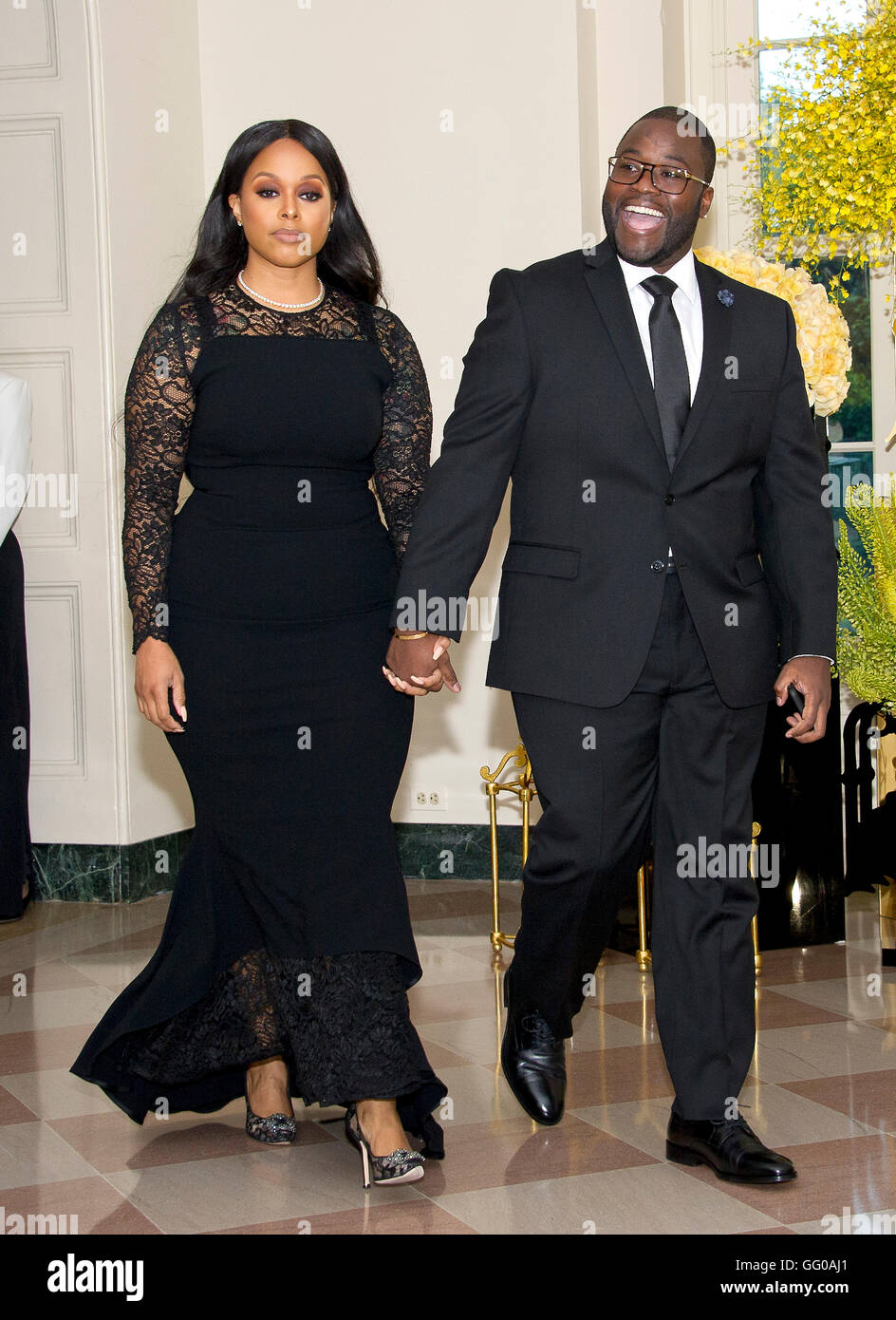 Singer Chrisette Michele and Doug Ellison arrive for the State Dinner