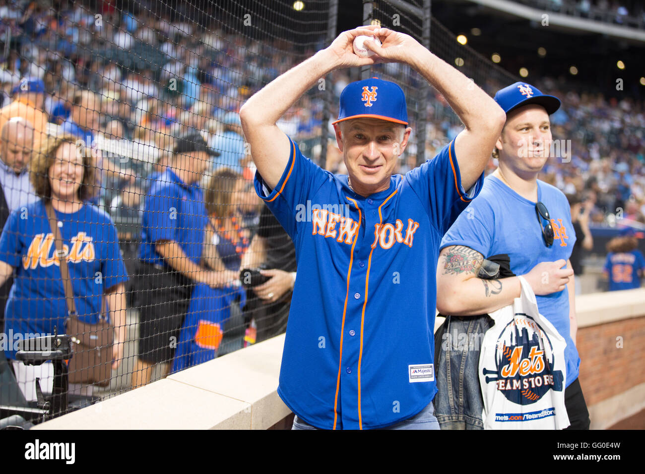Nyc, United States. 01st Aug, 2016. John McEnroe throws the first pitch at the New York Mets vs New York Yankees baseball game at Citifield. Credit:  Louise Wateridge/Pacific Press/Alamy Live News Stock Photo
