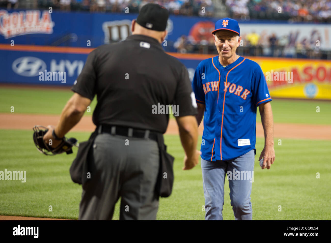 Nyc, United States. 01st Aug, 2016. John McEnroe throws the first pitch at the New York Mets vs New York Yankees baseball game at Citifield. Credit:  Louise Wateridge/Pacific Press/Alamy Live News Stock Photo