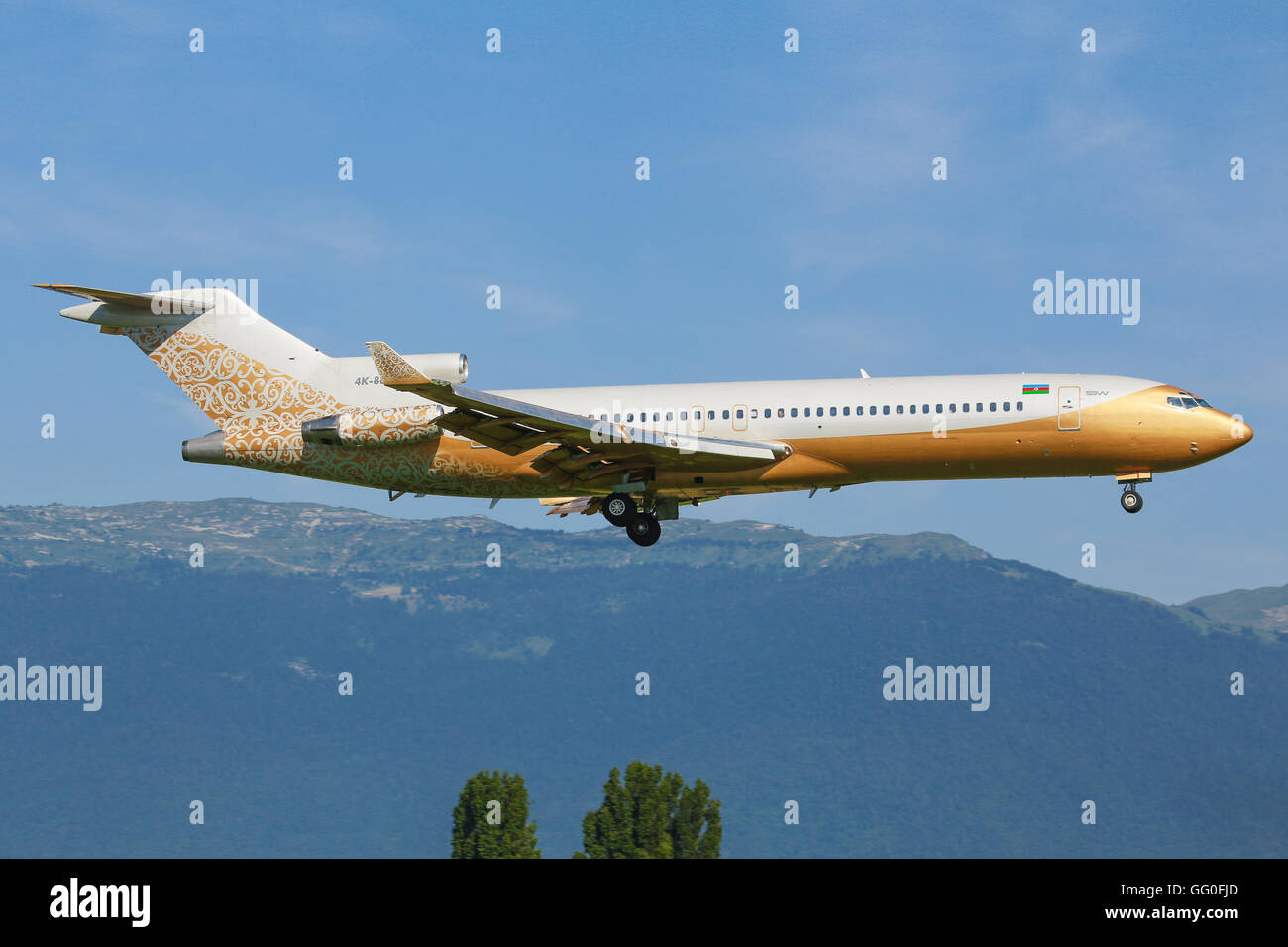 Genf/Switzerland August 23, 2015: Golden old 727 from SW Business Aviation landing at Genf Airport. Stock Photo
