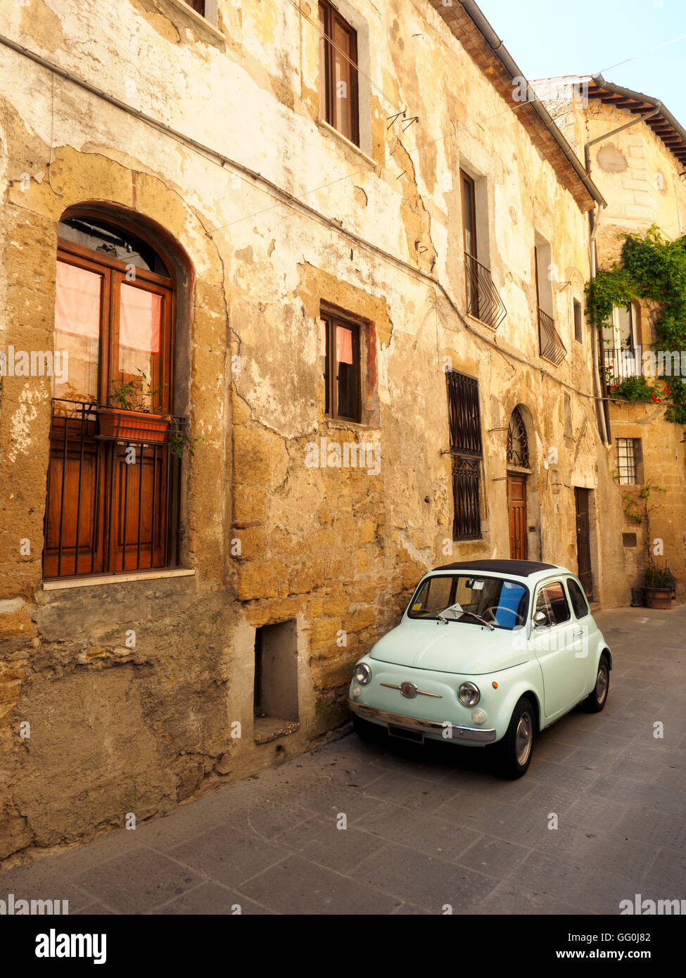 Old Fiat 500 in a street of Pitigliano - Italy Stock Photo - Alamy