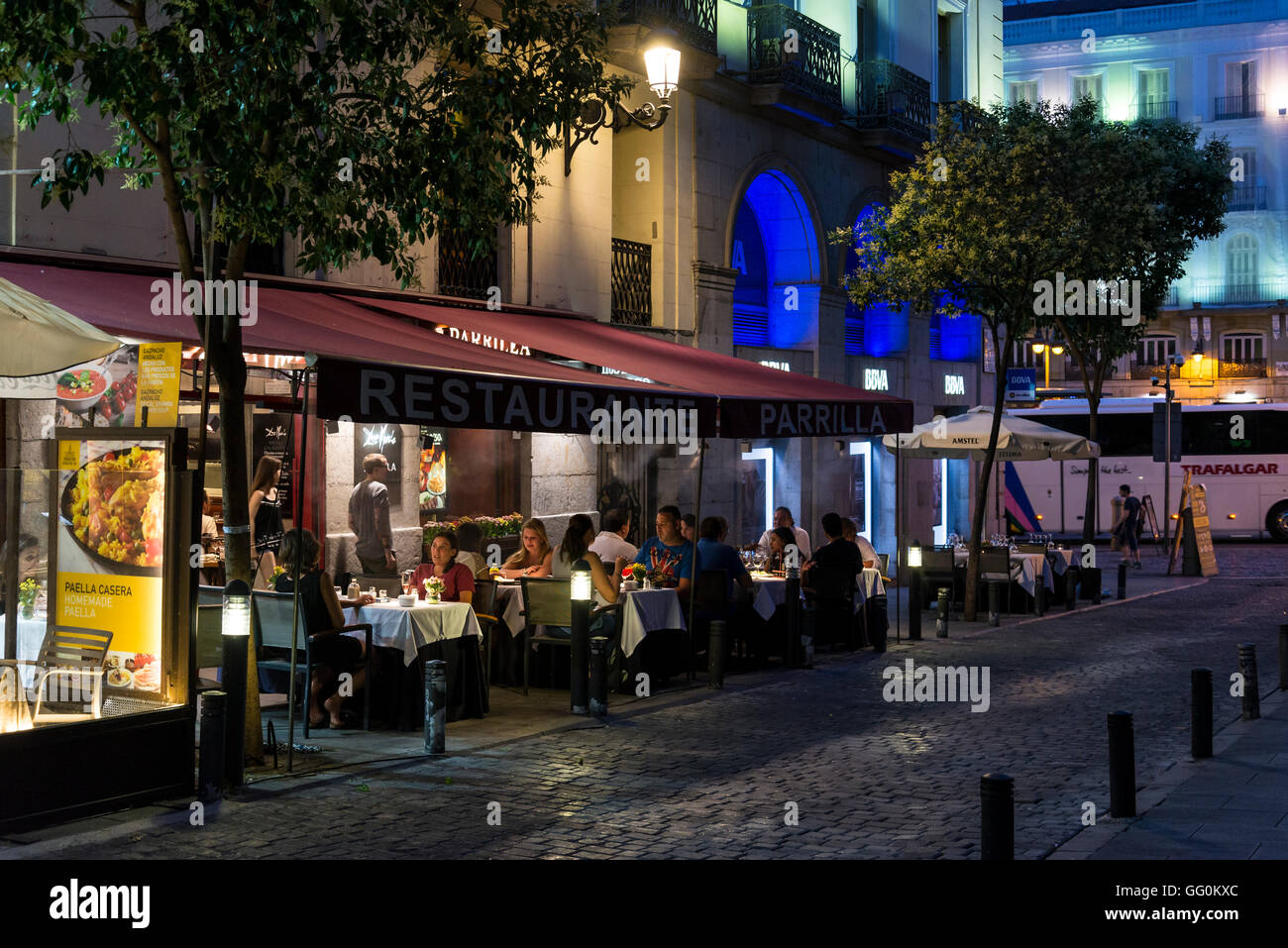 Outdoor restaurant in a street off Puerta del Sol, Madrid, Spain Stock  Photo - Alamy