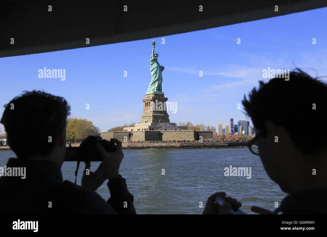 Statue of Liberty on Liberty Island with the skyline of Lower Manhattan