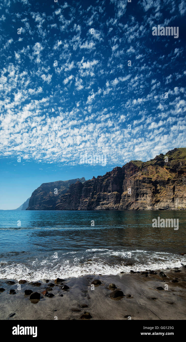los gigantes cliffs nature landmark and volcanic black sand beach in south tenerife island spain Stock Photo