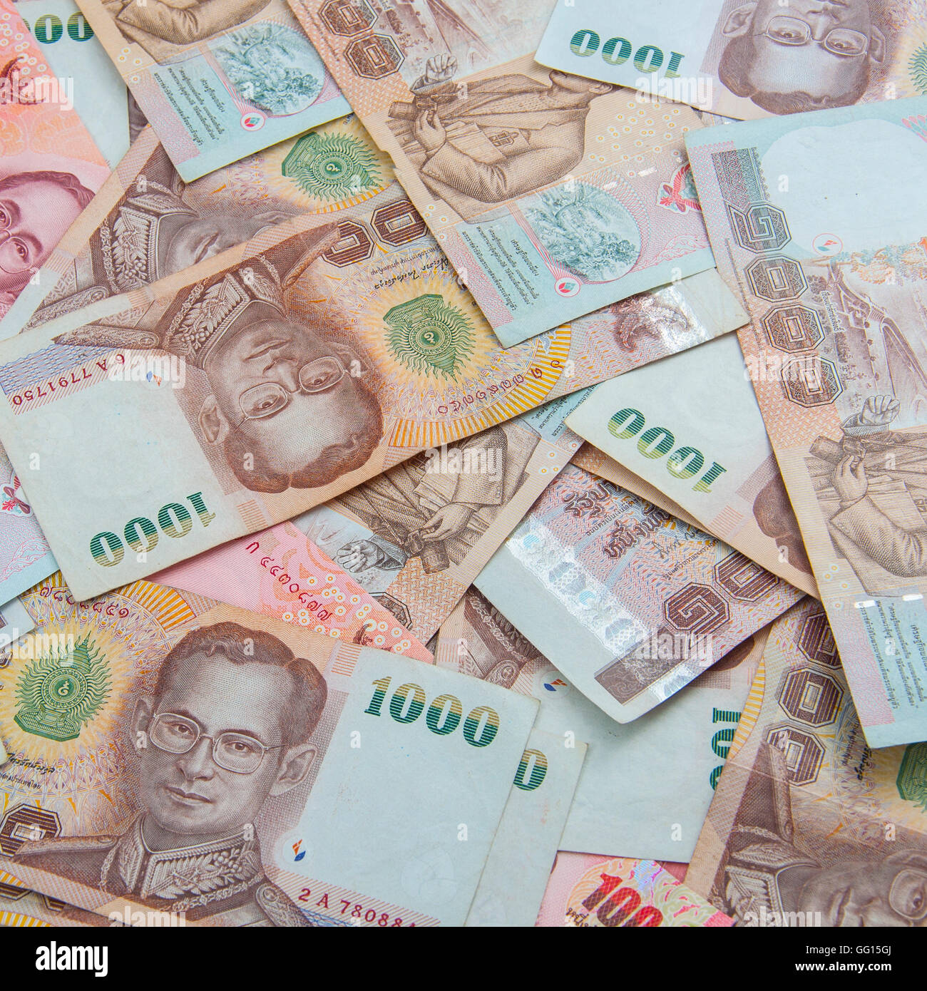 Thailand currency with Thousand banknotes background Stock Photo