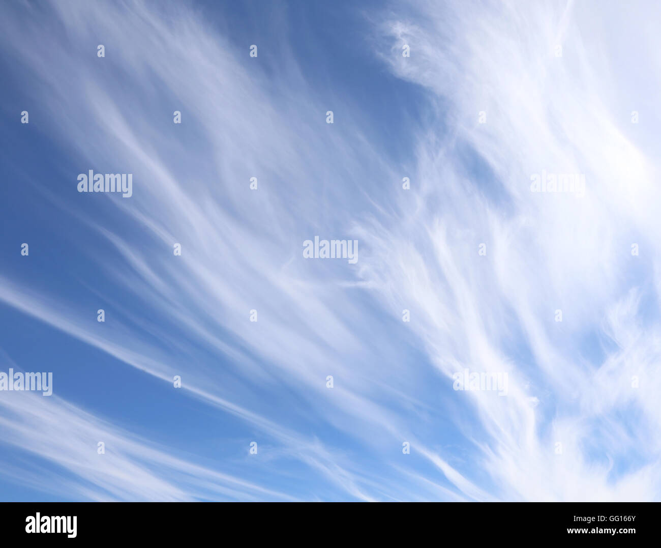 high strange white clouds in the blue sky after the storms Stock Photo