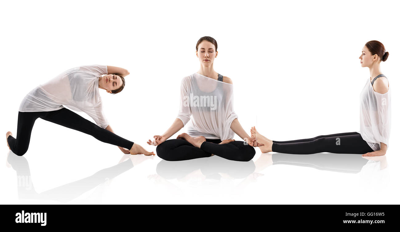 Woman practicing yoga in the lotus position Stock Photo