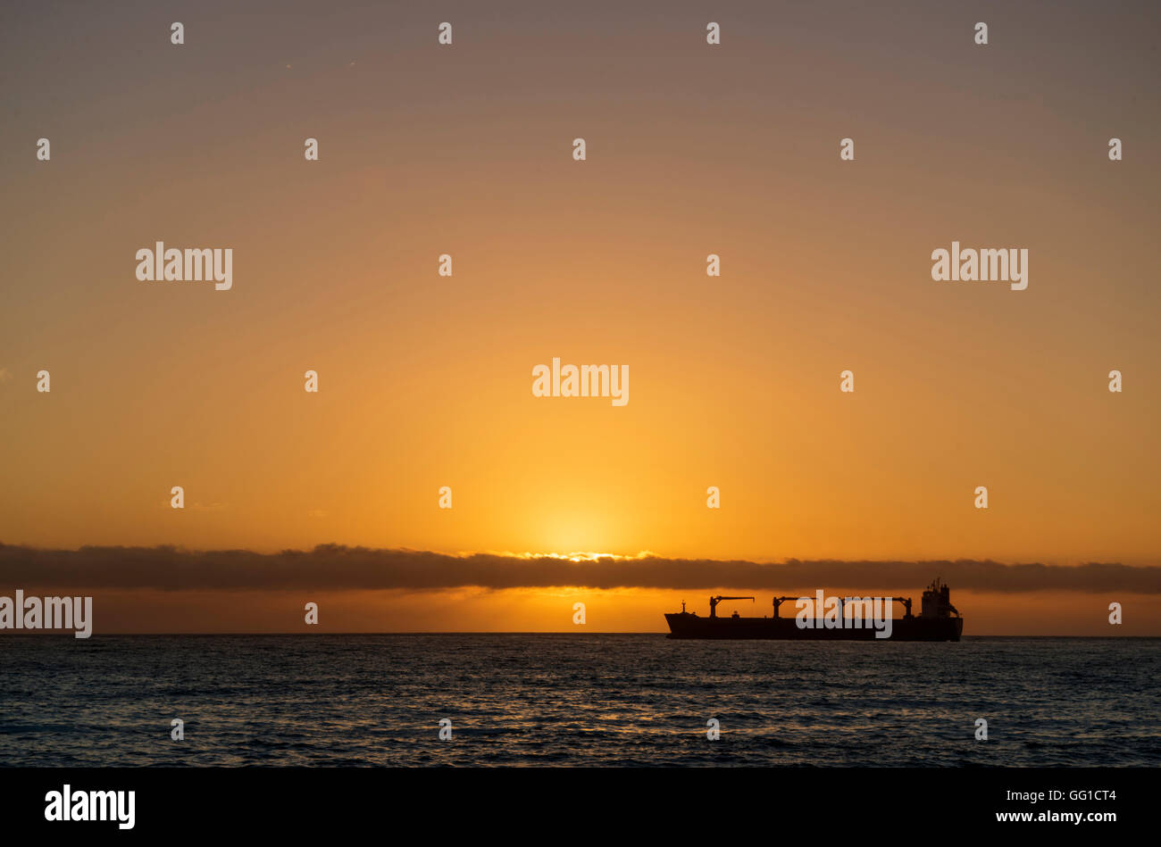 Cargo ship horizon blue sky clouds hi-res stock photography and images ...
