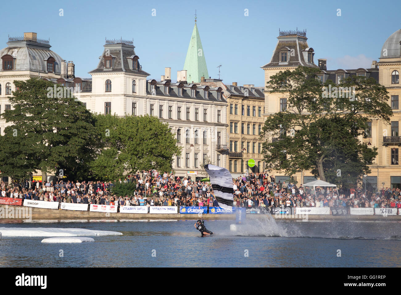 Copenhagen, Denmark - July 30, 2016: A skydiver landing in a lake for the Swoop Challenge event. Stock Photo