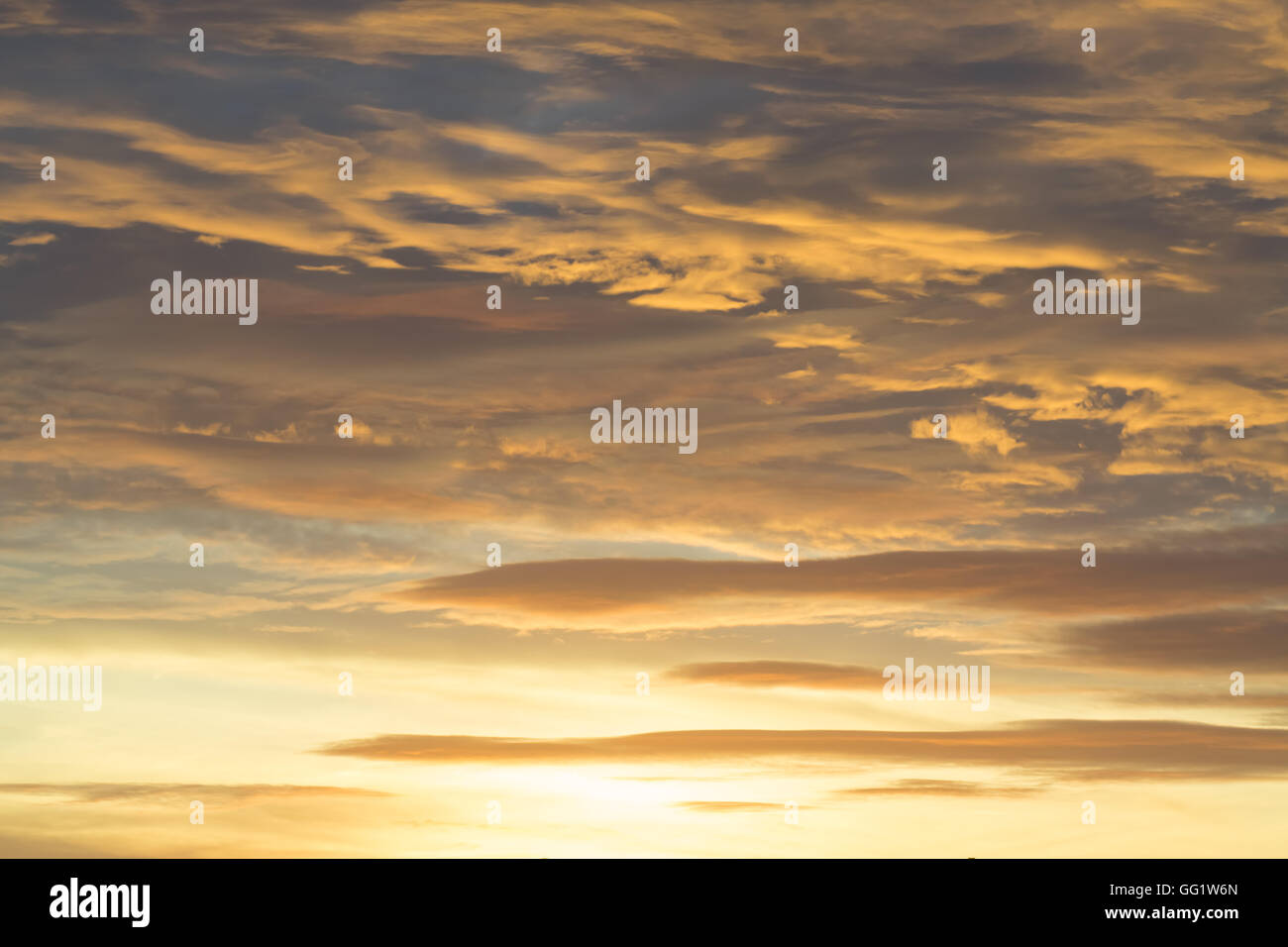 Sunset with clouds, light rays and other atmospheric effect Stock Photo ...