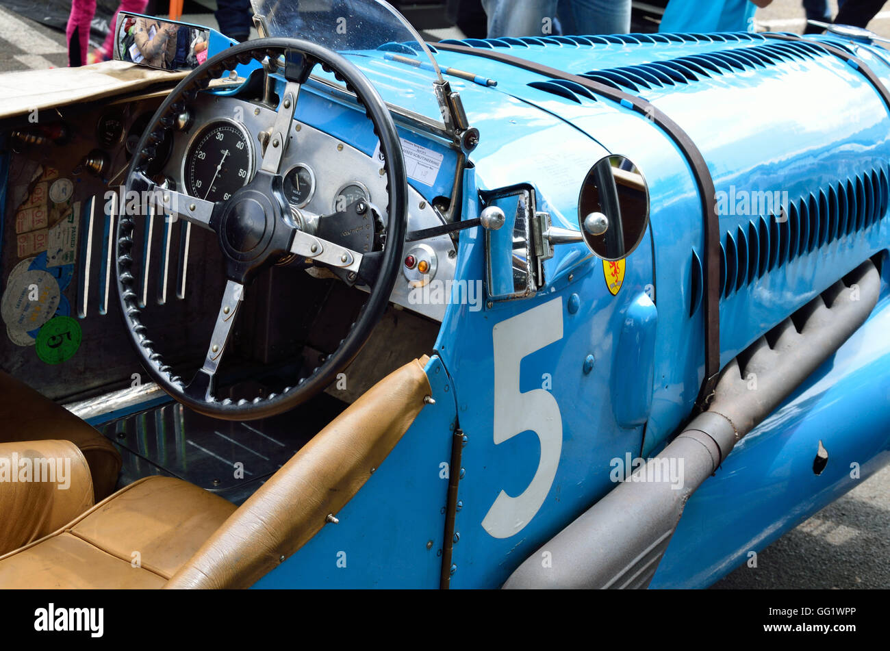 Interior and exterior of the vintage racing car. The inner and outer space of the old-fashioned race automobile. Stock Photo