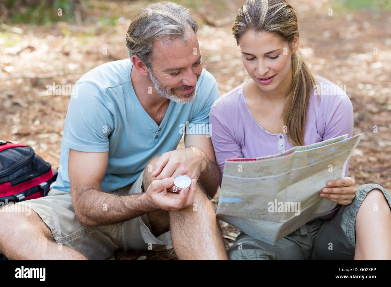 Hiker couple navigation map hi-res stock photography and images - Alamy