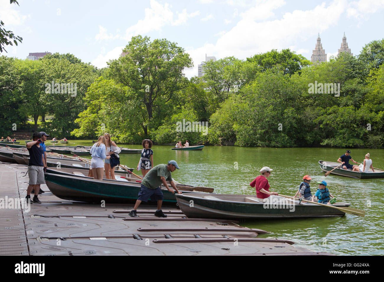 People launch row boats on a warm summers day near the The Loeb