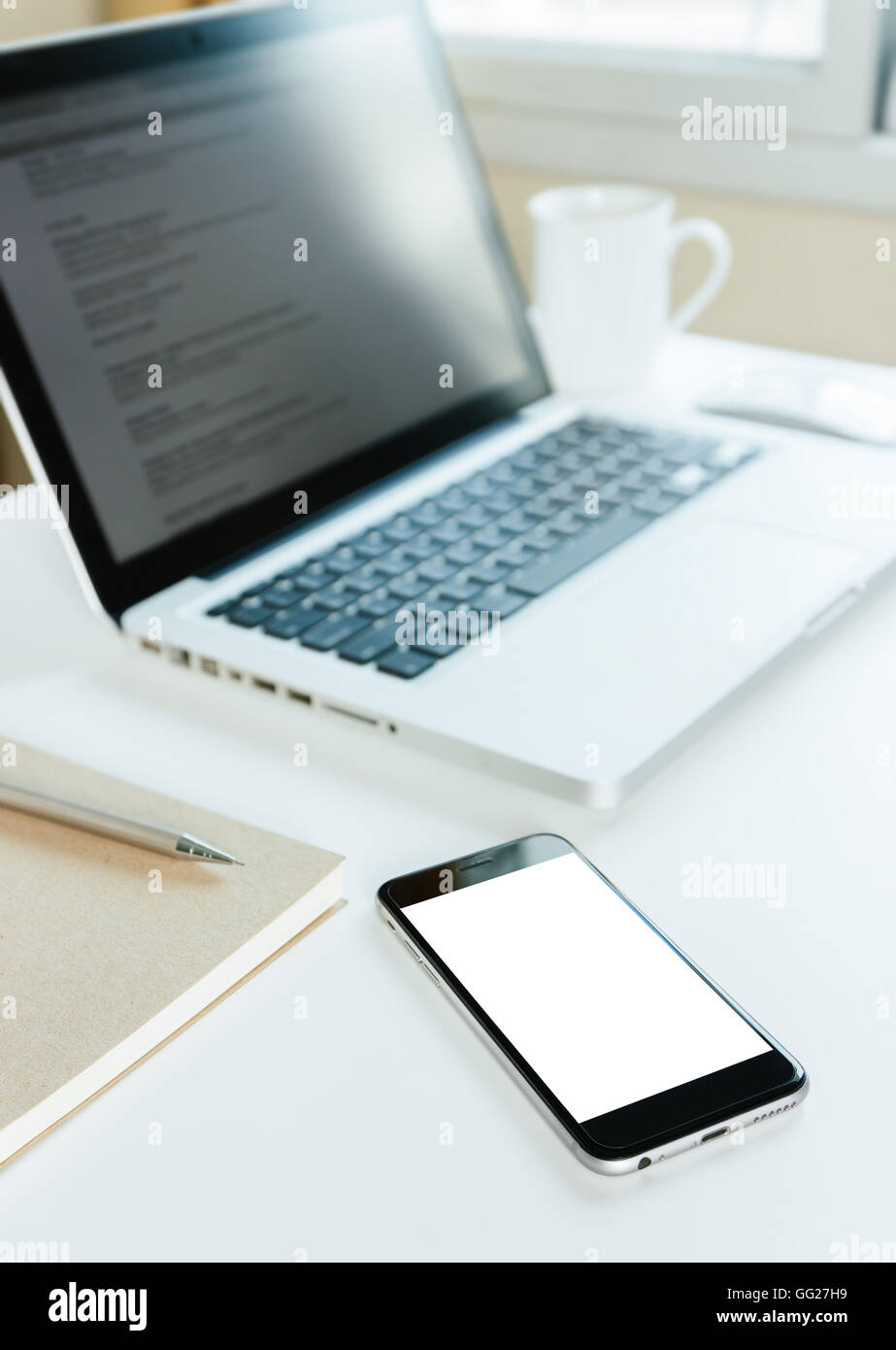 phone blank screen on workspace table Stock Photo