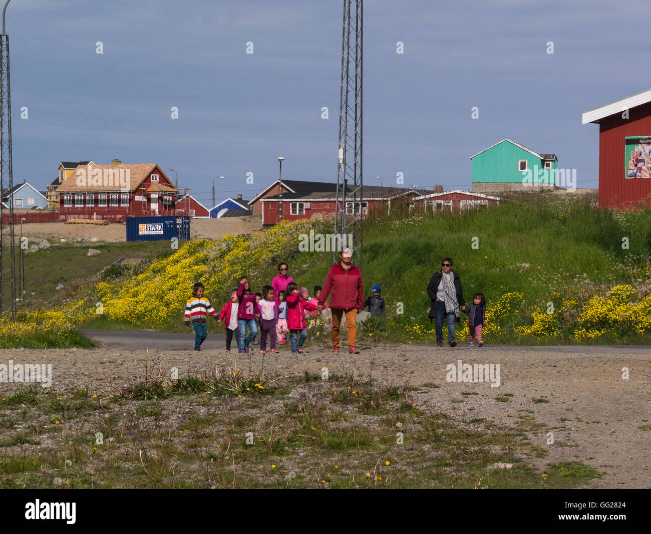 Parents with group school children at end of school day  Narsaq Southern Greenland small fishing farming community in  Kujalleq municipality Stock Photo